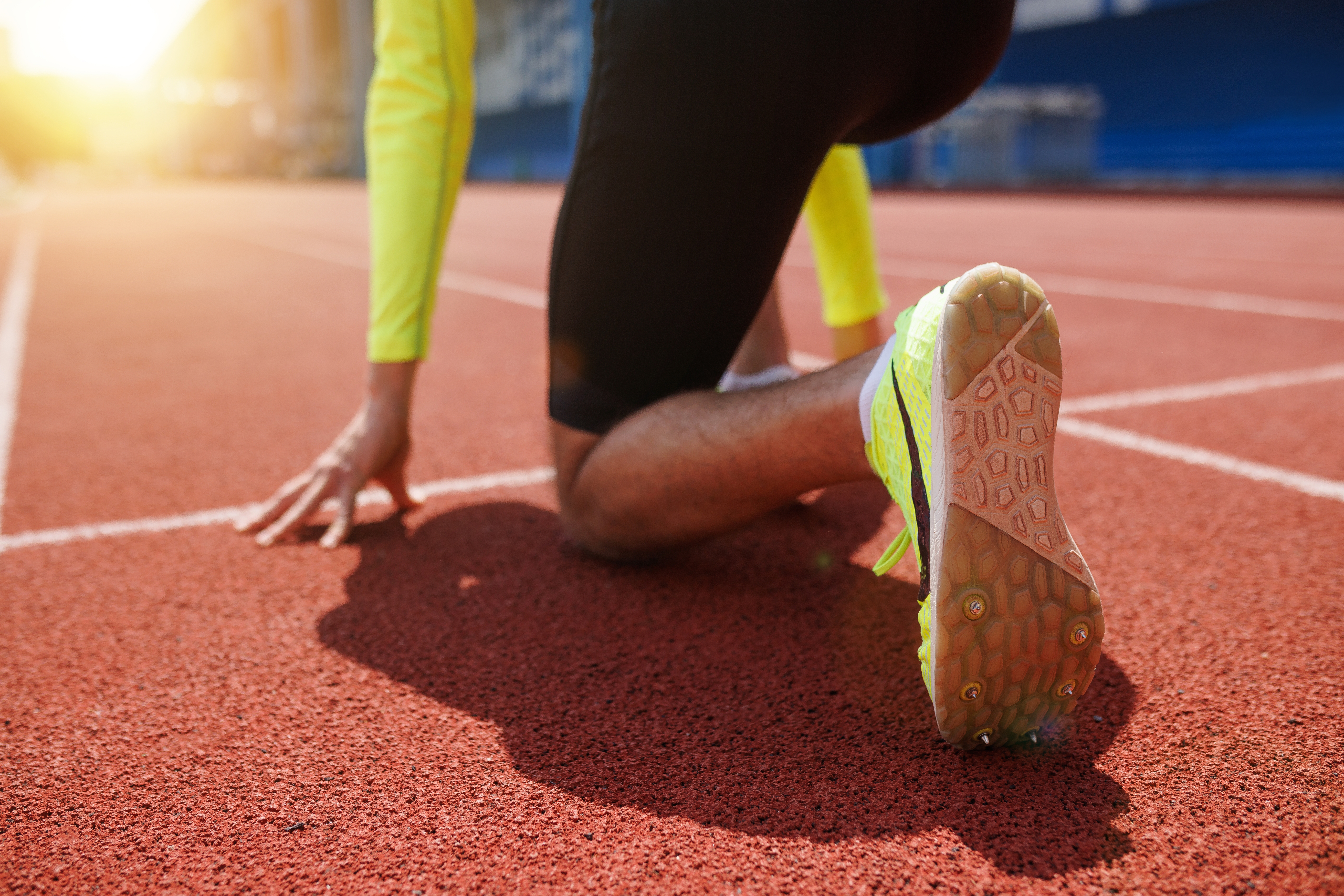 Running,Shoe,Of,Athletic,Runner,Training,In,Stadium,At,Sunset, | Mind Your Performance